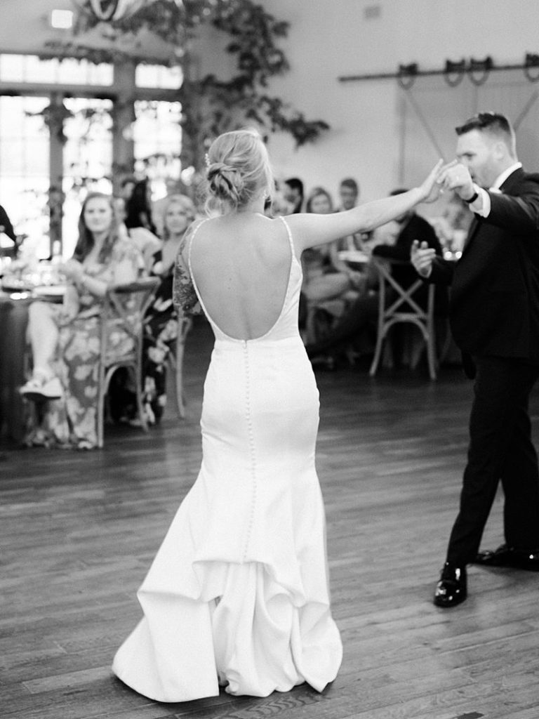 A bride and groom dance during their wedding at King Family Vineyards. Photographed by Virginia wedding photographer Kim Branagan