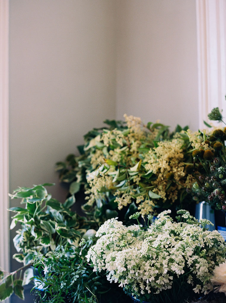 Yellow and white flowers and greenery photographed by floral workshop photographer Kim Branagan