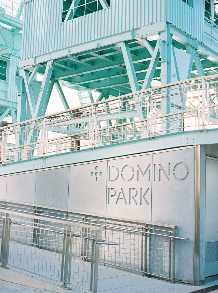 Domino Park in Williamsburg, Brooklyn, New York. Words engraved on wall say "Domino Park."