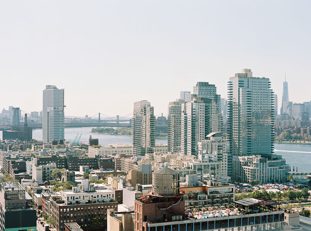 View of the Manhattan skyline on a sunny day. Taken by New York commercial photographer Kim Branagan