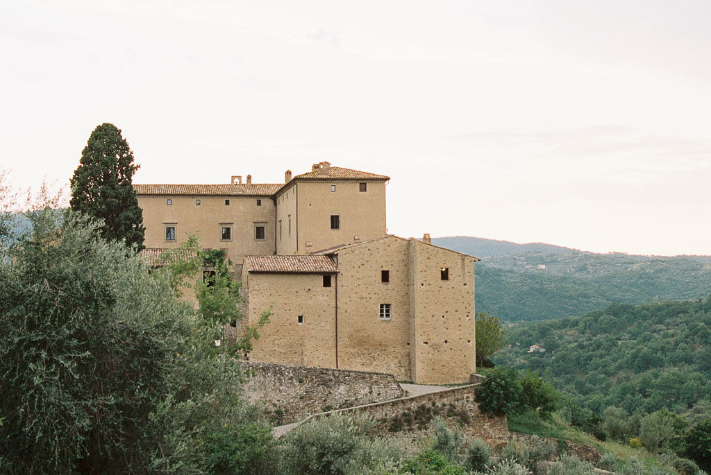 View of the side of Castello di Potentino in the Florence countryside. Clarity Retreat - A Floral Workshop by Ponderosa & Thyme | Florence, Italy. Photographed by Florence brand and editorial photographer Kim Branagan.