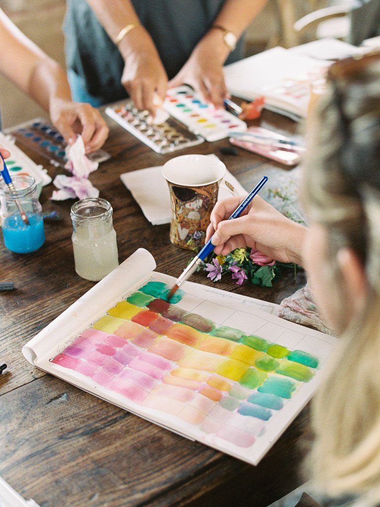 Closeup shot of a colorful, water color painting. Clarity Retreat - A Floral Workshop by Ponderosa & Thyme | Florence, Italy. Photographed by Florence brand and editorial photographer Kim Branagan.